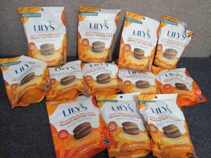 lot 125 image: 12- 3.2 oz Bags Lilys Milk Chocola...