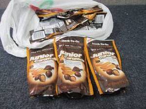 lot 166 image: 8- 4.5 oz Bags Junior Caramels...