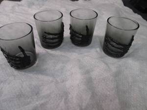 lot 416 image: 4 Skeleton Hand 3 oz Shot Glasses...