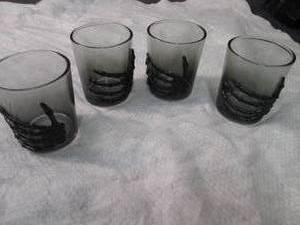 lot 417 image: 4 Skeleton Hand 3 oz Shot Glasses...