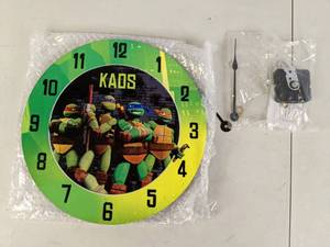 lot 126 image: Teenage Mutant Ninja Turtles Wall Clock