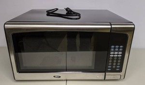 lot 137 image: Oster 1.3 Cu. Ft. 1000-Watt Countertop Microwave Oven with Stainless Steel Front