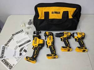 lot 98 image: DeWalt Atomic 20V MAX Brushless Cordless 4-Tool Combo Kit - DrillDriver, Impact Driver, Saw, Multi-Tool