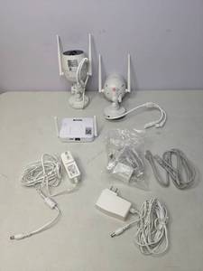lot 27 image: Revo Wireless 4-Channel Gateway Surveillance System with 2 Full HD Bullet Cameras