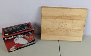 lot 317 image: Betty Crocker 7-Speed Hand Mixer and Personalized Cutting Board