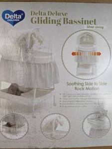 lot 362 image: Delta Deluxe Gliding Bassinet
