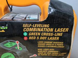 lot 13 image: New Johnson Level Self-Leveling Combination Green Cross-Line and Red 5 Dot Laser Level