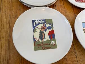 lot 130 image: 4 Pottery Barn Hawaiian Themed Plates With Wicker Case
