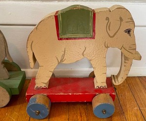 lot 160 image: Two Vintage Wooden Elephant Pull Toys
