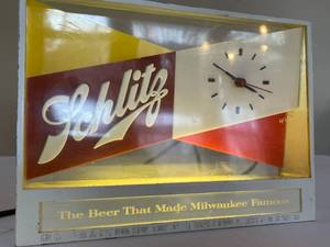 lot 227 image: Vintage Lighted Schlitz Clock