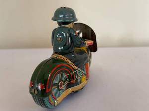 lot 234 image: Vintage Tin Motorcycle Toy