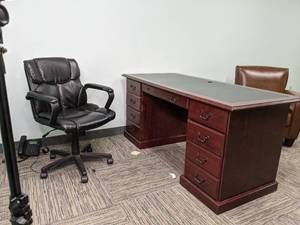 Desk with adjustable chair, one han...