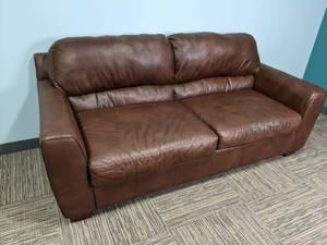 Ashley furniture Brown faux leather...