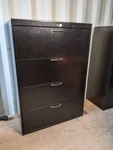 Black metal filing cabinet measures...