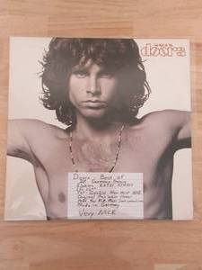 lot 64 image: THE DOORS - BEST OF - 1985 - VINYL LP