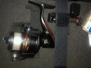lot 65 image: Marlboro bag with fishing reel rodlures