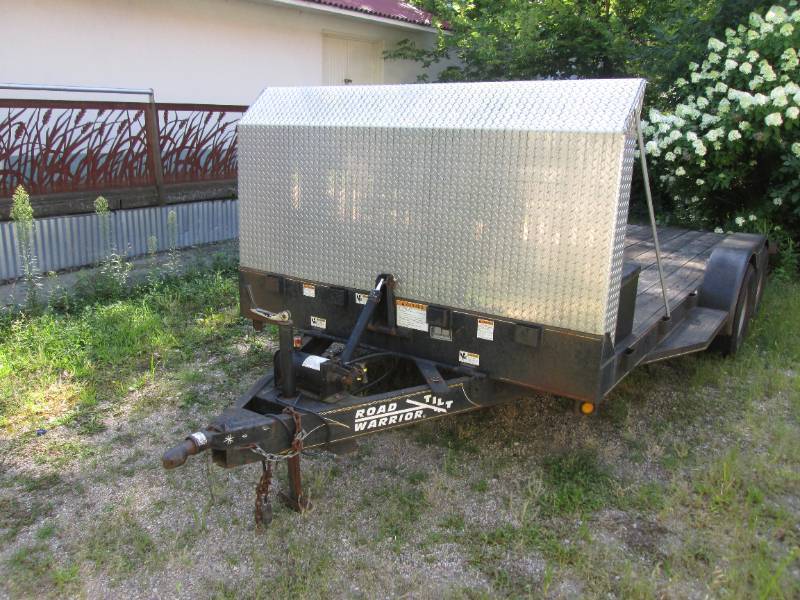 2002 Road Warrior tilt bed trailer - features electric winch, dual axle.