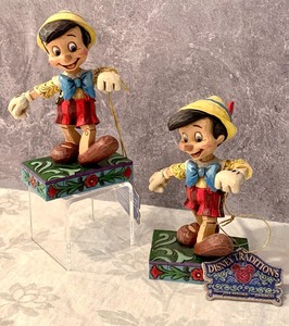 lot 25 image: Pair of Jim Shore Disney Traditions Ornaments
