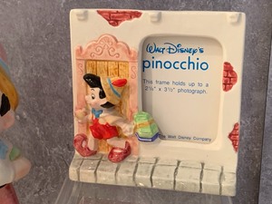 lot 20 image: Pinocchio Collectables including Picture Frames, Figurines and 1970 Pinocchio Matchbox Lesney No 7