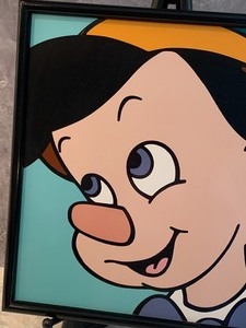 lot 4 image: Pinocchio Painted Tile by Brenda White