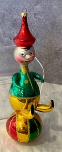 lot 77 image: Multi Colored Pinocchio Ornament