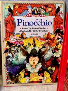lot 74 image: Variety of Eight Books about Pinocchio