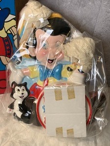 lot 66 image: Schmid Pinocchio Wall Clock - New in Box