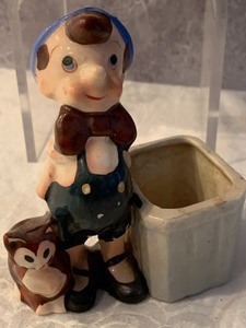 lot 60 image: Two Vintage Pinocchio Planters