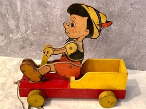 lot 52 image: Vintage Wooden Pinocchio Pull Toy