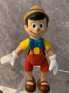 lot 47 image: Variety of Six Pinocchio Figurines