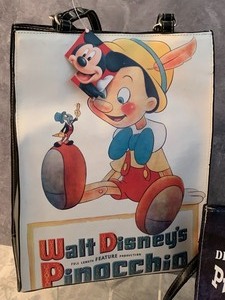 lot 31 image: Three Pinocchio Themed Handbags