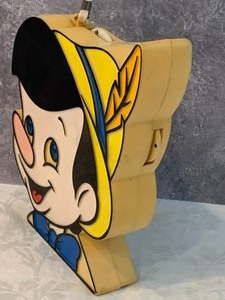 lot 87 image: Adorable Vintage AM Transistor Pinocchio Radio