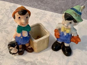 lot 88 image: Two Vintage Pinocchio Figurines including a Planter