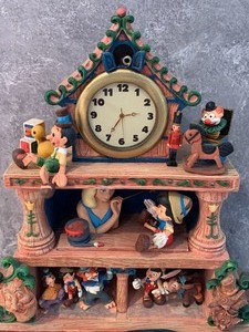 lot 89 image: Detailed Pinocchio Clock with Figurines