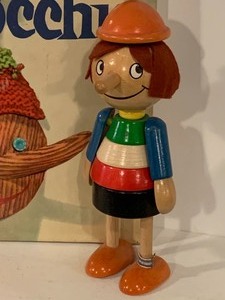 lot 159 image: Adorable Vintage Pinocchio Book & Figurine