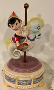 lot 155 image: Two Musical Pinocchio Figurines by Schmid