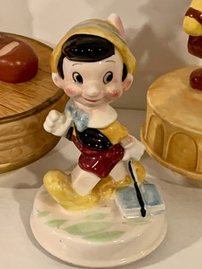 lot 133 image: Three Musical Pinocchio Figurines