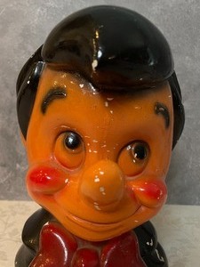 lot 110 image: Big Head Pinocchio Bank