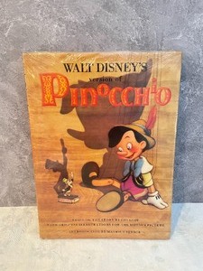 lot 122 image: Pinocchio Book, Video & Figurine