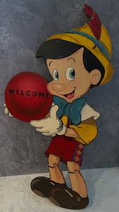 lot 114 image: Handpainted Wooden Pinocchio Welcome Sign
