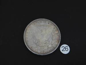 lot 26 image: 1884 BU Morgan Silver Dollar