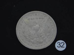 lot 32 image: 1886-O Morgan Silver Dollar