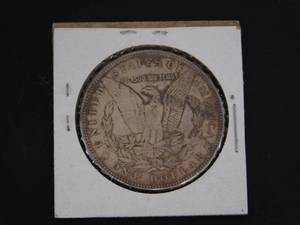 lot 33 image: 1887 Toned AU Morgan Silver Dollar