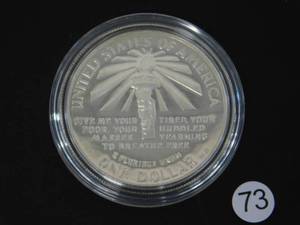 lot 73 image: 1986-S Proof Statue of Liberty Silver Comm. Dollar Price Guide $39.00
