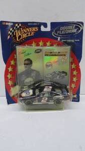 lot 10 image: Rusty Wallace double platinum cards with car