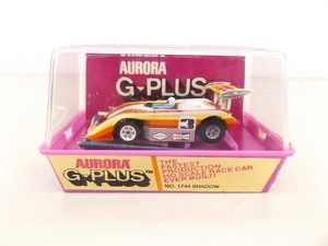 lot 73 image: 7 Vintage AFX G-Plus HO Slot Cars 