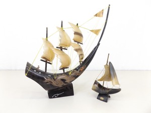 lot 76 image: 2 Carved Buffalo Horn Ship Models