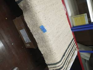 lot 11 image: LIGHT GREY AREA RUG