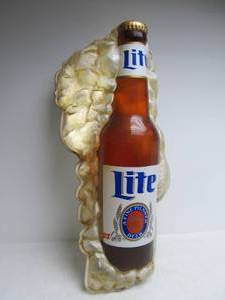 lot 36 image: Large Vintage MILLER LITE Beer Display Bottle Sign