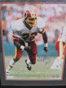 lot 50 image: Dexter Manley Framed Jersey & Large Photo - Both Autographed.